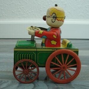 Yone Crazy Clown Wind-Up Tin Toy